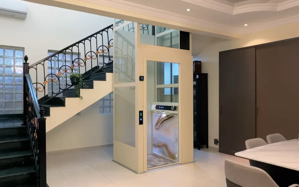 Cibes home lift installed inside a Dubai villa next to a staircase.